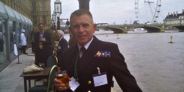 John Wood next to the River Thames