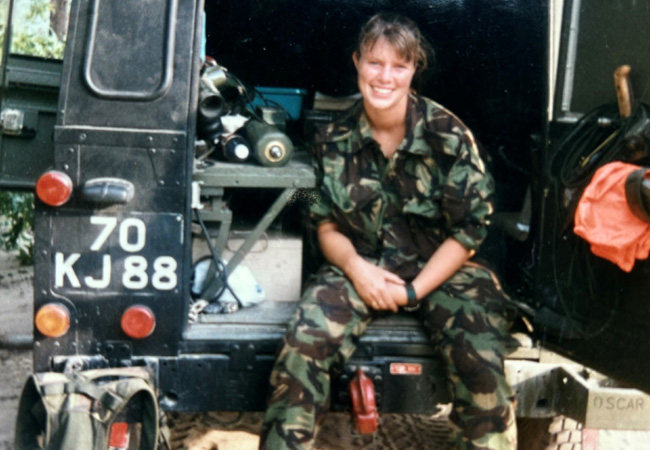 Miranda Pusey sat on the tail gate of her jeep