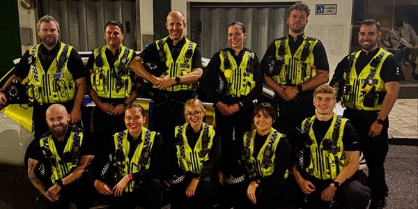 Group of police officers posing for a group photo