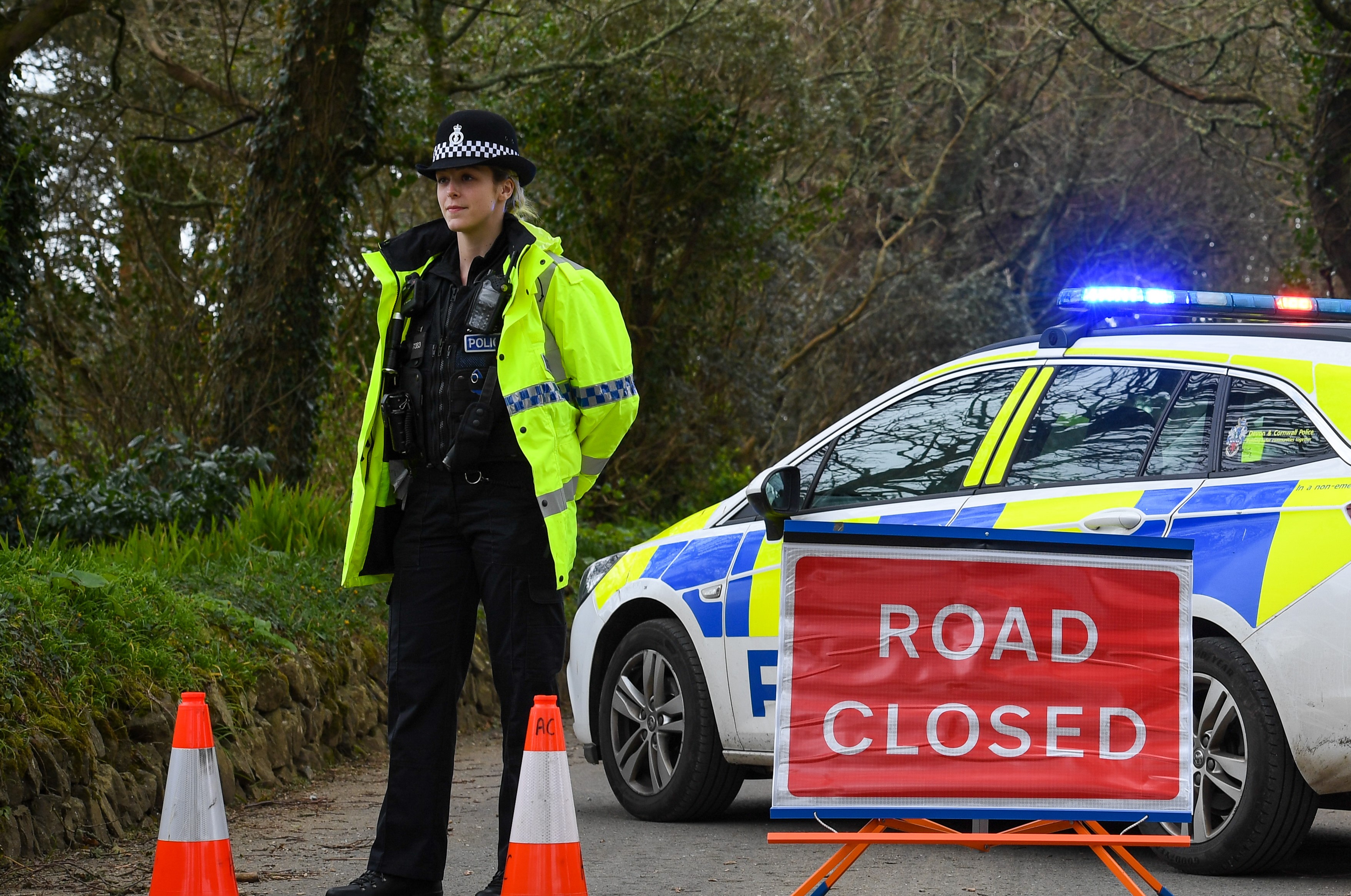 Female Police Officer guarding a road closure