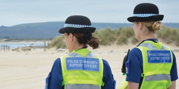 PCSO talking to a member of staff